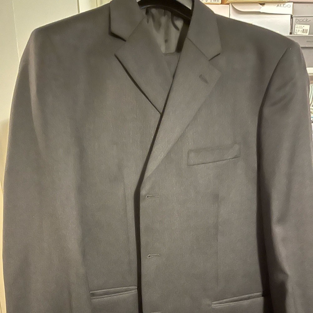 Black wool suit.
